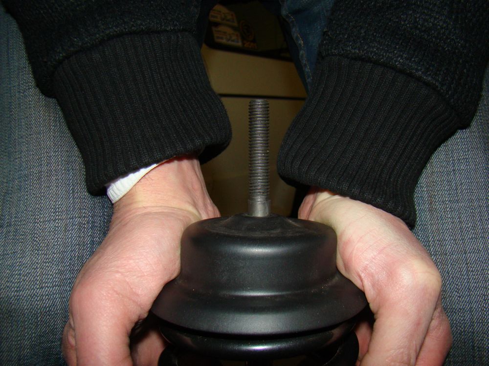 la coupelle en appui sur la butée